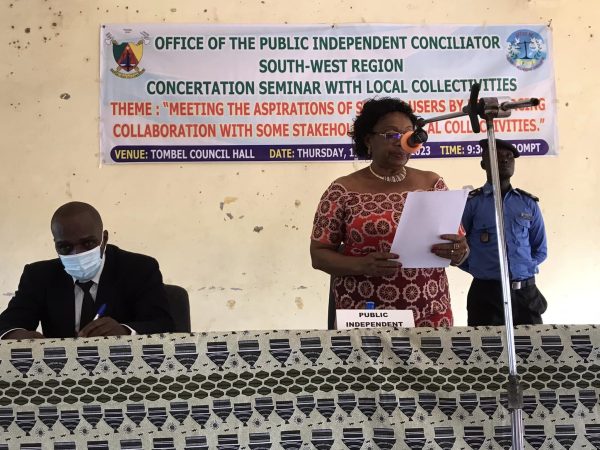 The Public Independent Conciliator, Mme Telelen Dorothy Atabong spouse Motaze delivery Addressing participants